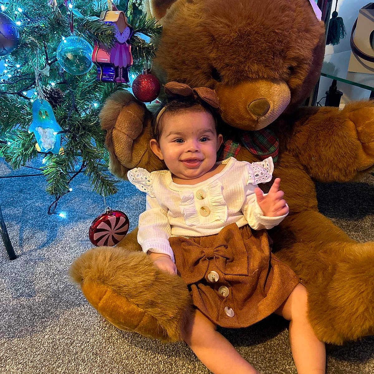 Ezme joined the competition — help win amazing prizes! animal, baby, bear, clothing, costume, couch, face, furniture, happy, head, lighting, person, photography, plant, plush, portrait, sitting, teddybear, toy, tree