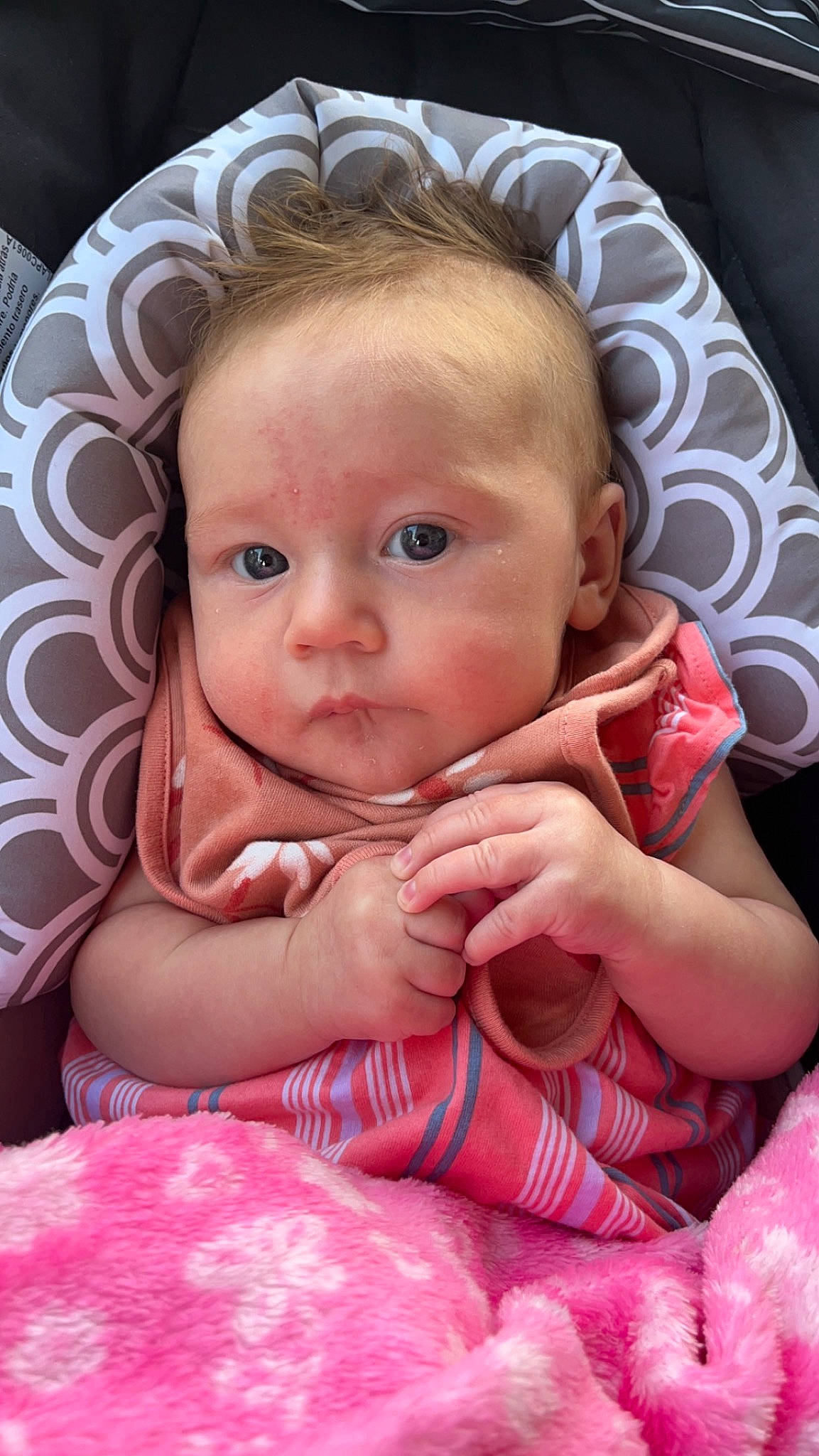 Denzleigh is registered to the contest to win money with this photo: baby, baby_toddler_clothing, cheek, chin, comfort, eye, eyebrow, eyelash, finger, gesture, happy, head, iris, lip, mouth, nose, person, pink, skin, textile