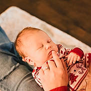 Atticus joined the competition — help win amazing prizes! baby, sleeping, infant, hand, finger, jeans, clothing, pajamas, person, lap, cozy, family, indoor, closeup, peaceful, skin, cute, toddler, comfort, touch