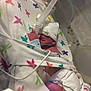 Jack is registered to the contest to win money with this photo: newborn, baby, incubator, medical_tubes, hospital, blanket, diaper, hat, monitoring_wires, infant, premature, care, healthcare, swaddled, sleeping, fragile, neonatal, butterfly_pattern, person, bed