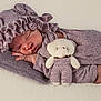 baby, newborn, sleeping, teddy_bear, stuffed_animal, hat, bonnet, clothing, cozy, soft_texture, cute, infant, peaceful, portrait, child, pink, fabric, resting, cute_outfit, indoor