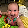 Journie is registered to the contest to win money with this photo: baby, child, smiling, happy, indoor, toy, colorful, face, person, infant, play, activity_center, clothing, furniture, carpet, home, cute, expression, closeup, joy