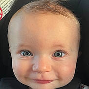 Alaric joined the competition — help win amazing prizes! baby, child, infant, face, portrait, close_up, eyes, smiling, car_seat, vehicle, hair, skin, blue_eyes, cheeks, head, seated, indoors, photography, closeup, happy