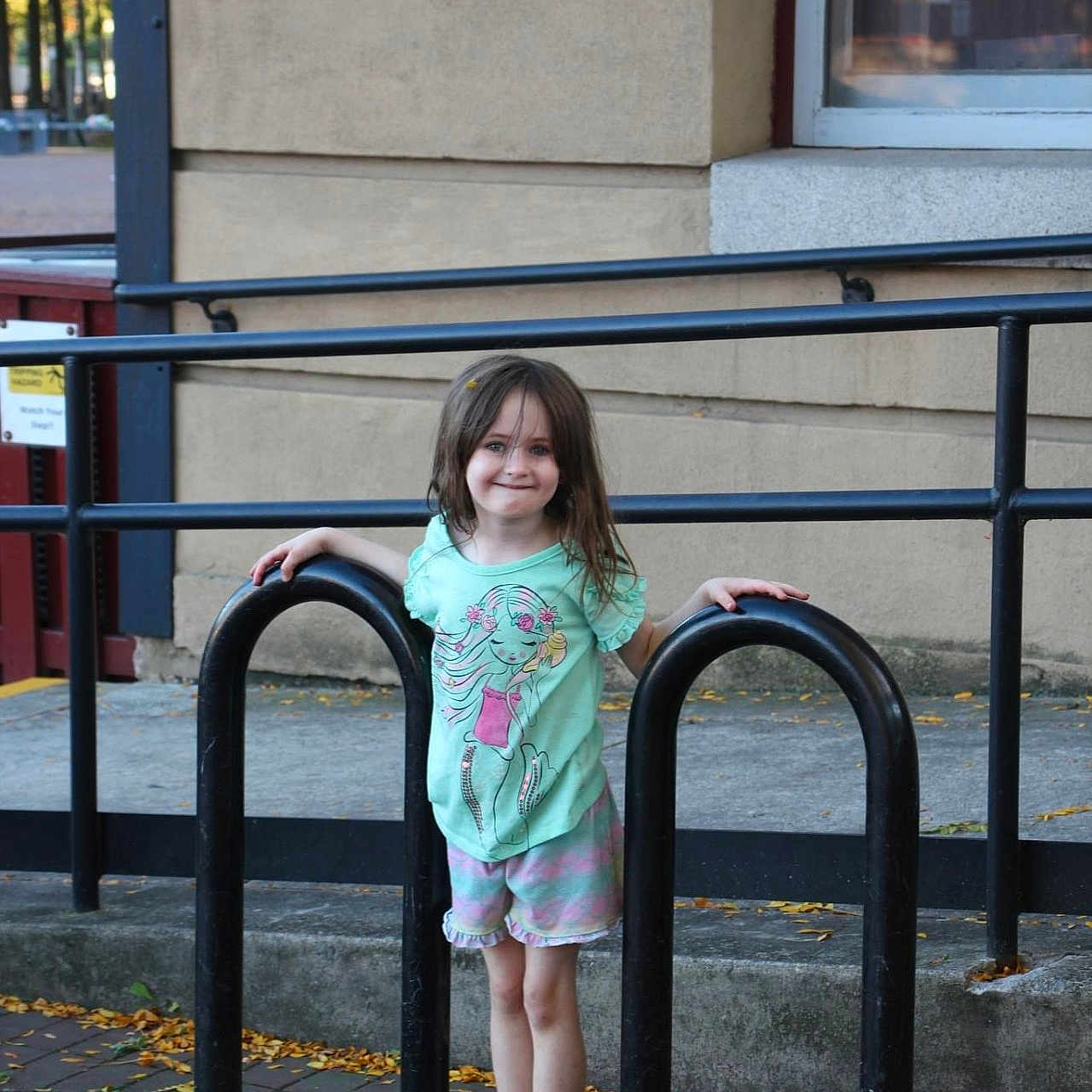 Addison joined the competition — help win amazing prizes! child, city, clothing, dress, face, female, footwear, girl, grass, handrail, head, outdoors, pants, person, photography, plant, portrait, railing, shorts, skirt