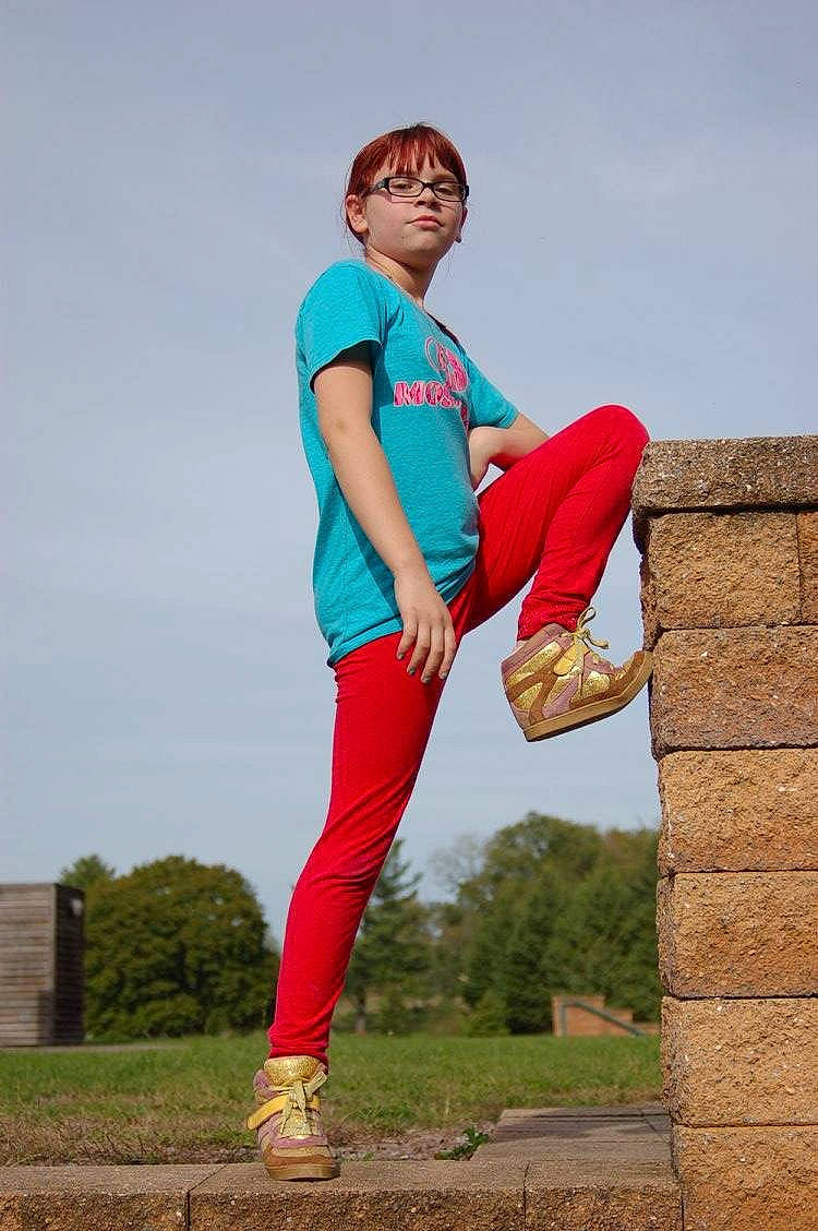 Destiny is registered to the contest to win money with this photo: electric_blue, jeans, leg, person, photography, pink, recreation, red, sportswear, standing