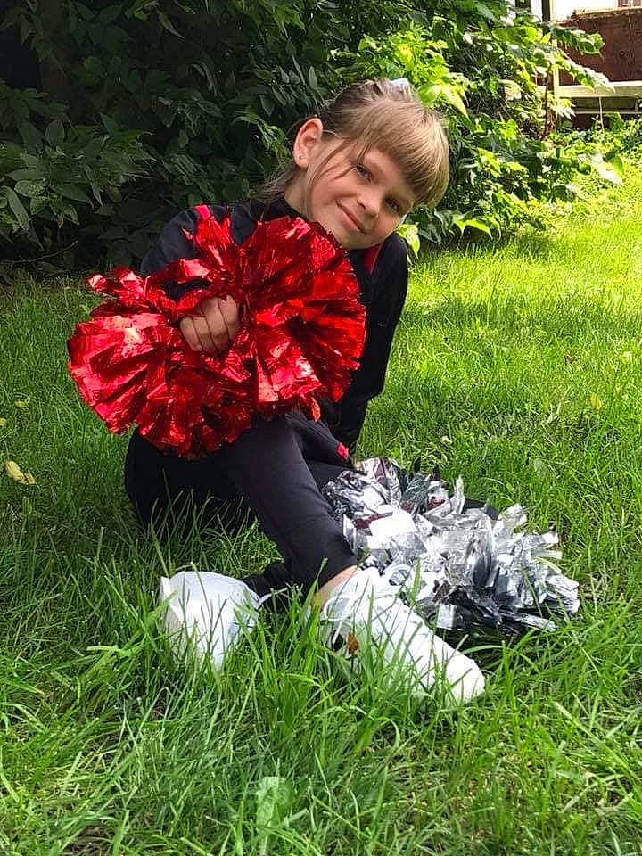 Harley is registered to the contest to win money with this photo: botany, flower, grass, joy, person, plant