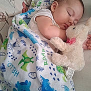 Abel joined the competition — help win amazing prizes! baby, sleeping, blanket, dinosaur, plush_toy, bunny, child, cute, cozy, rest, peaceful, indoor, soft_toy, infant, toddler, comfort, fabric, pattern, face, nap