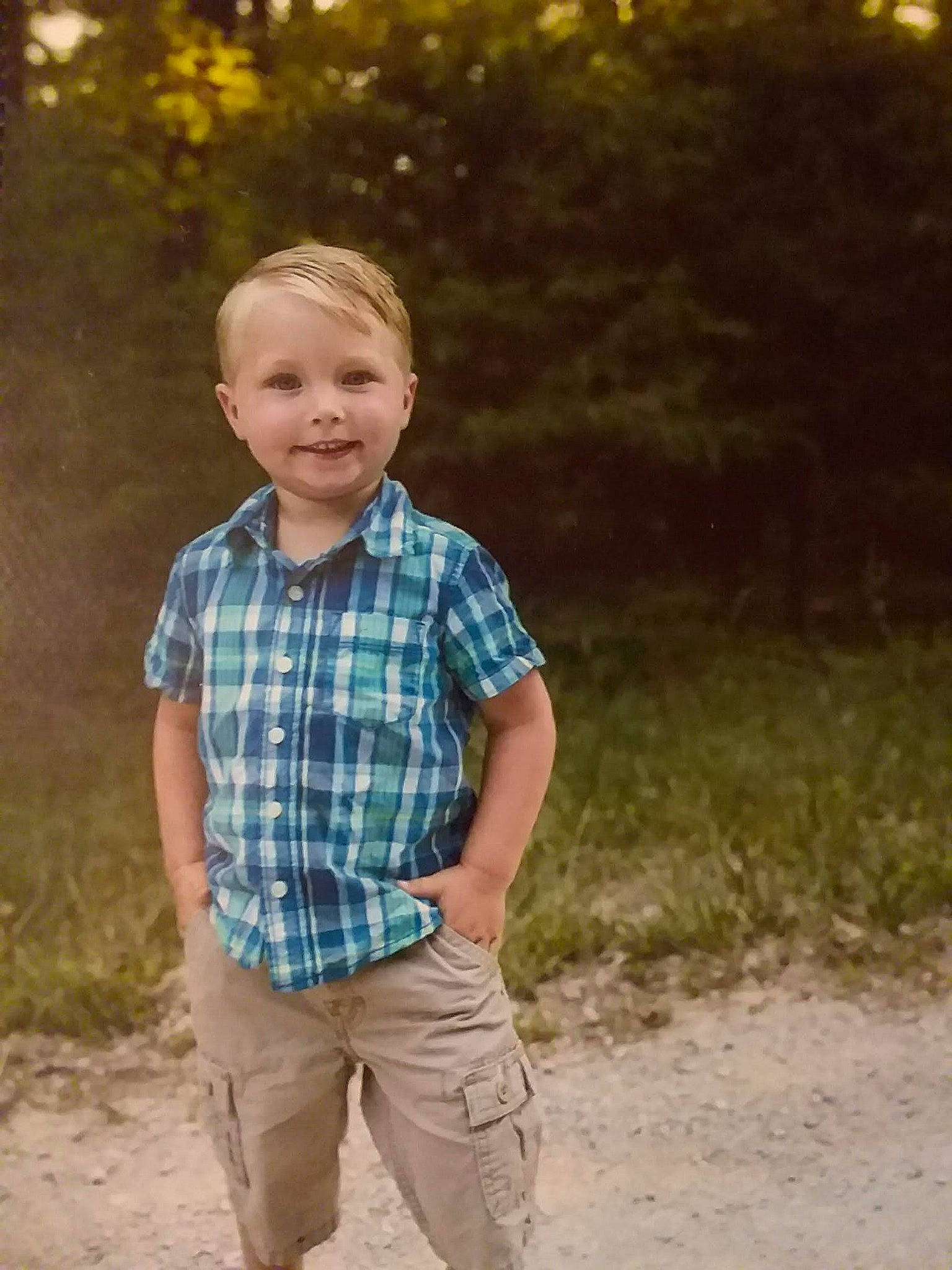 Aiden is registered to the contest to win money with this photo: child, design, fun, grass, joy, male, pattern, people, people_in_nature, person, photograph, photography, plaid, portrait, smile, standing, summer, tartan, textile, toddler