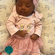 Laura joined the competition — help win amazing prizes! baby, infant, sleeping, headband, bow, pink_clothing, tutu, pacifier, blanket, polka_dot, pillow, small_hands, socks, nursery, peaceful, adorable, dark_skin, eyelashes, bedding, pattern