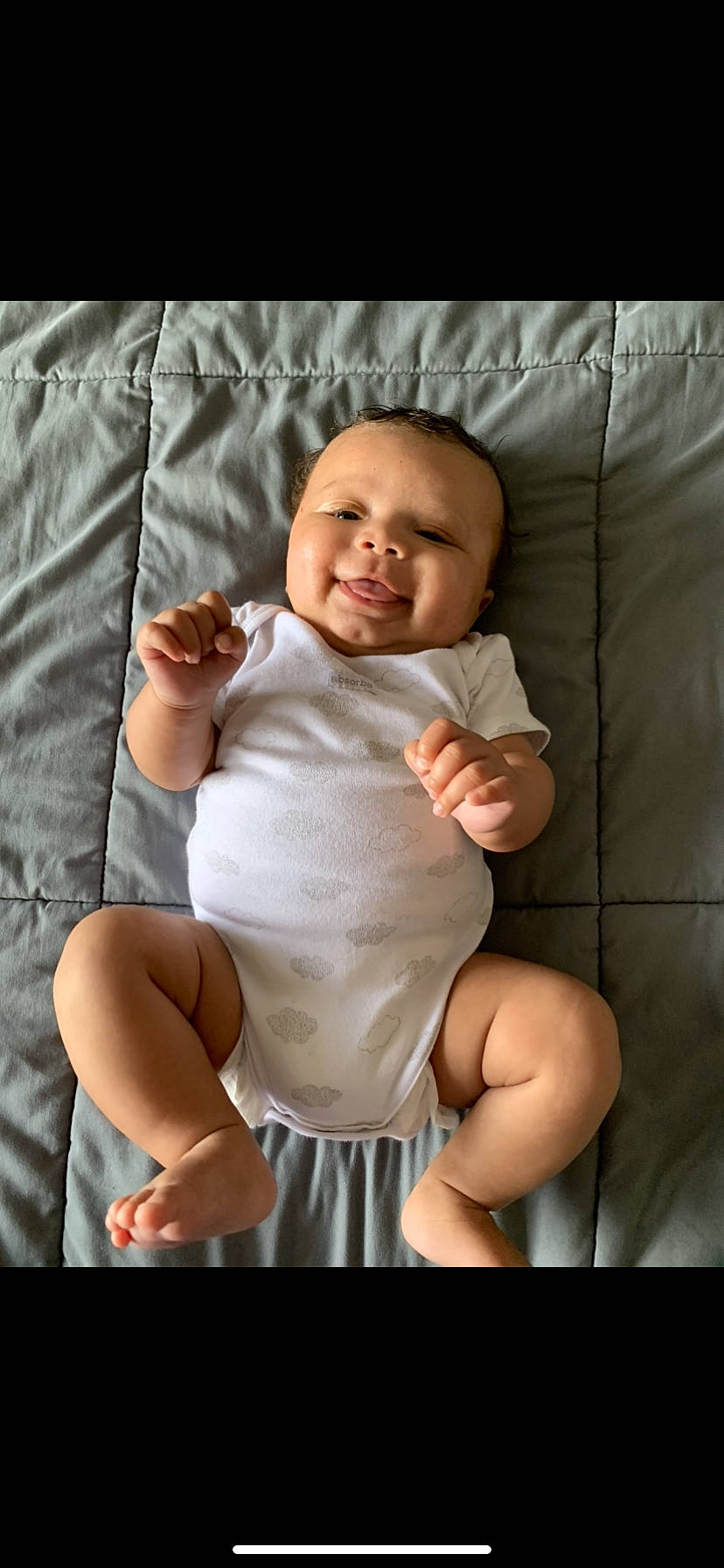 Khari is registered to the contest to win money with this photo: abdomen, baby, baby_toddler_clothing, cheek, comfort, elbow, eye, finger, flash_photography, head, human_leg, joy, knee, leg, muscle, person, skin, sleeve, stomach, thigh