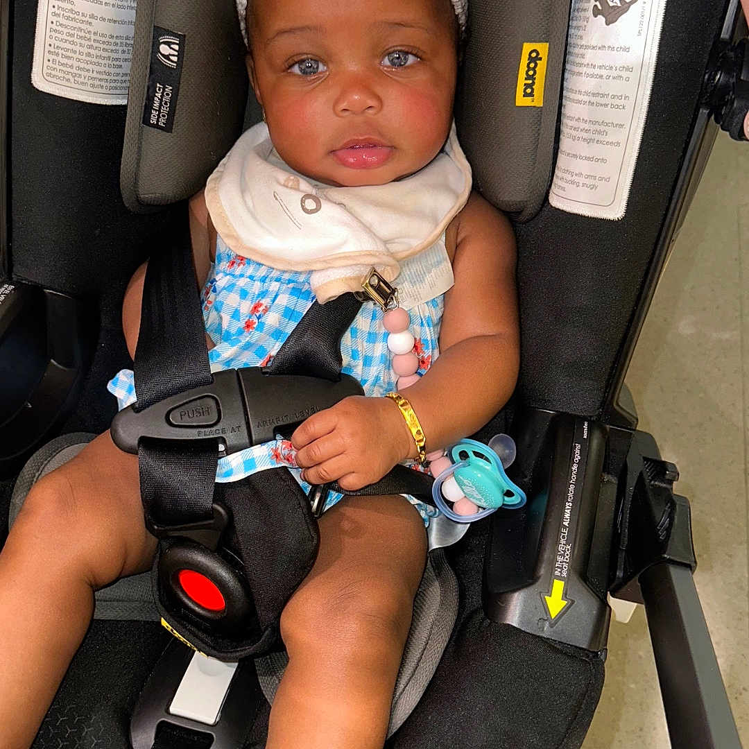 Ashlyn joined the competition — help win amazing prizes! accessories, baby, belt, bonnet, car, car_interior, carseat, clothing, cushion, face, hat, head, homedecor, person, photography, portrait, sitting, sunglasses, transportation, vehicle