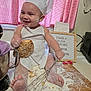 Josselyn Johanna joined the competition — help win amazing prizes! baby, child, chef_hat, apron, flour, cookie, whisk, kitchen, countertop, baking, messy, smile, happy, face_paint, cooking, food, cutebaby, indoor, person, playful