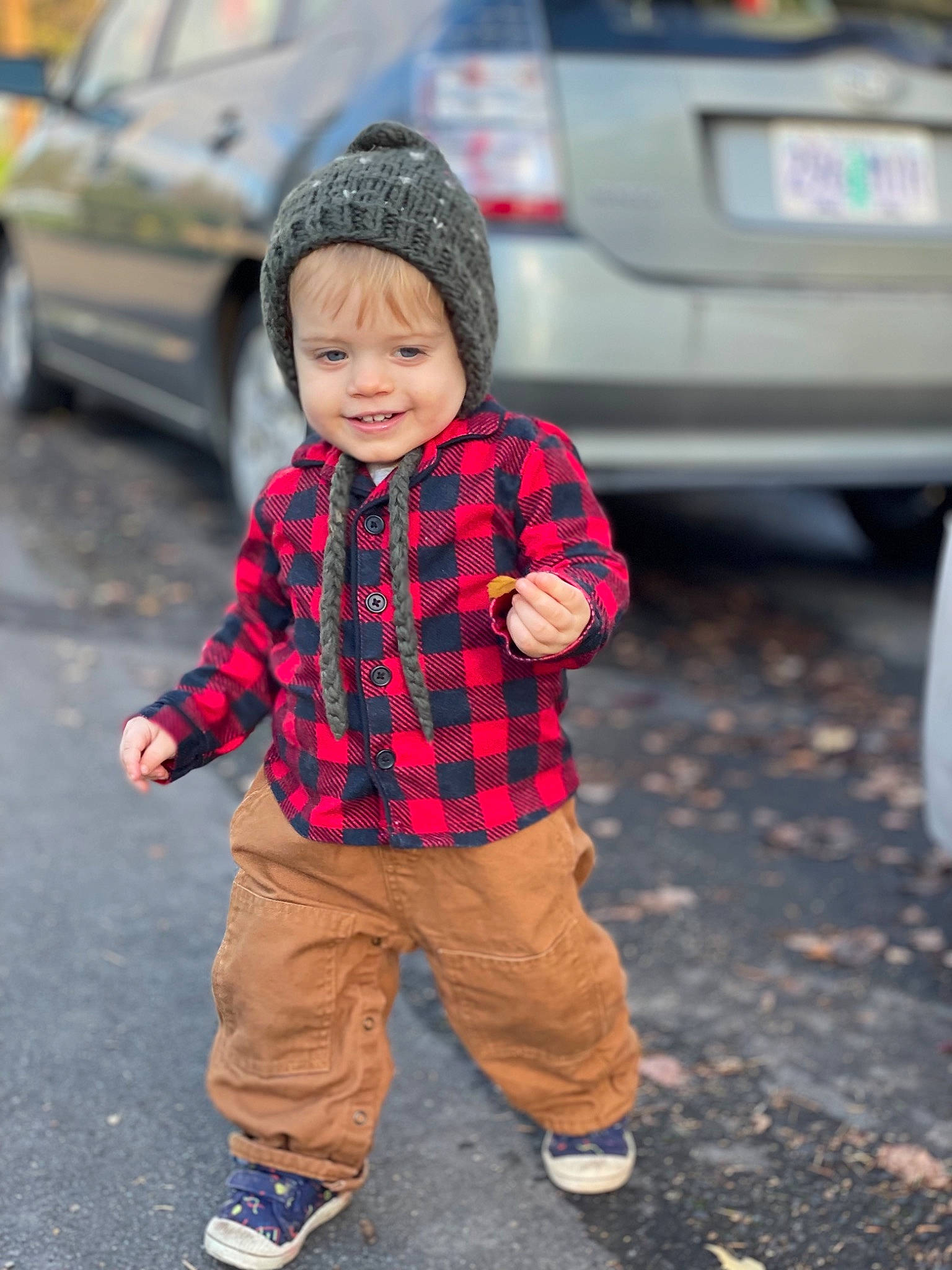 Thorn joined the competition — help win amazing prizes! asphalt, automotive_exterior, automotive_lighting, automotive_tire, car, footwear, hat, headwear, jacket, jeans, joy, outerwear, person, plaid, road_surface, shoe, street_fashion, tartan, tire, toddler