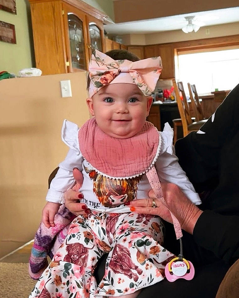 Emersyn is registered to the contest to win money with this photo: baby, baby_toddler_clothing, chair, child, costume, event, fashion_accessory, fashion_design, fun, gesture, happy, headgear, headwear, joy, magenta, party_supply, pattern, person, room, sitting