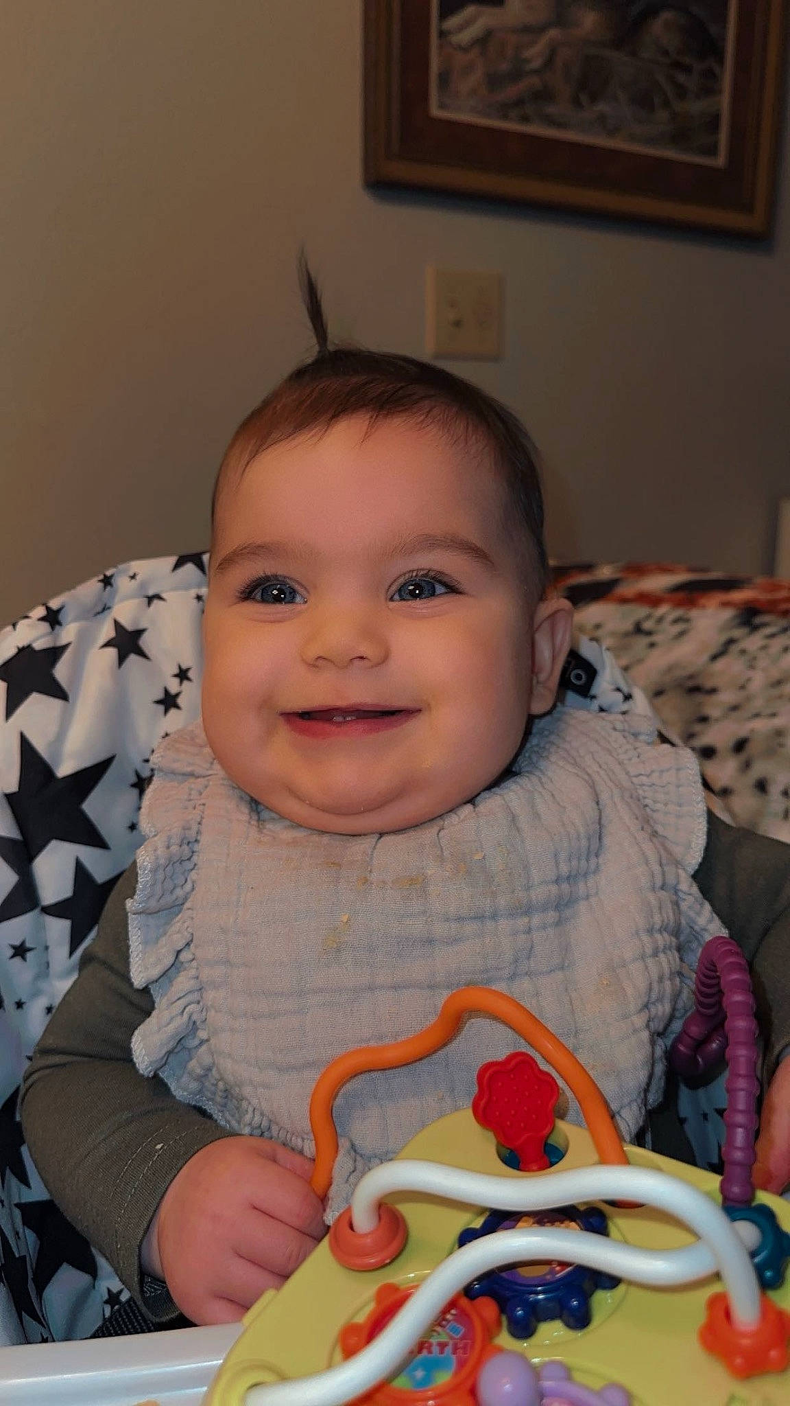Emersyn joined the competition — help win amazing prizes! baby, baby_products, baby_toddler_clothing, bib, cheek, child, eye, facial_expression, fun, happy, iris, joy, mouth, nose, person, picture_frame, room, sitting, skin, smile