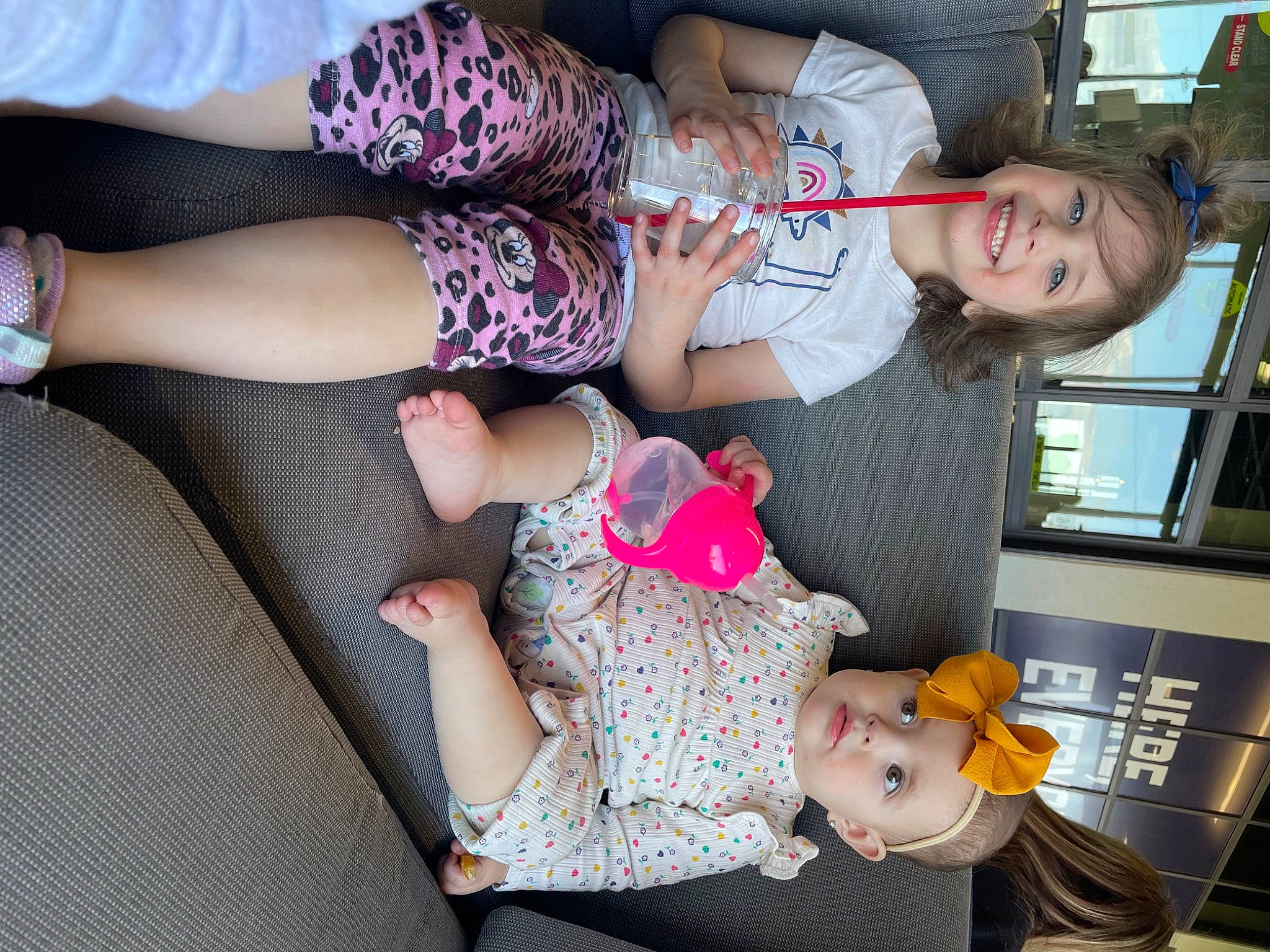 Aryah is registered to the contest to win money with this photo: child, comfort, event, fun, happy, hat, headwear, human_leg, joint, joy, lap, leisure, nail, pattern, person, pink, product, sitting, smile, sock