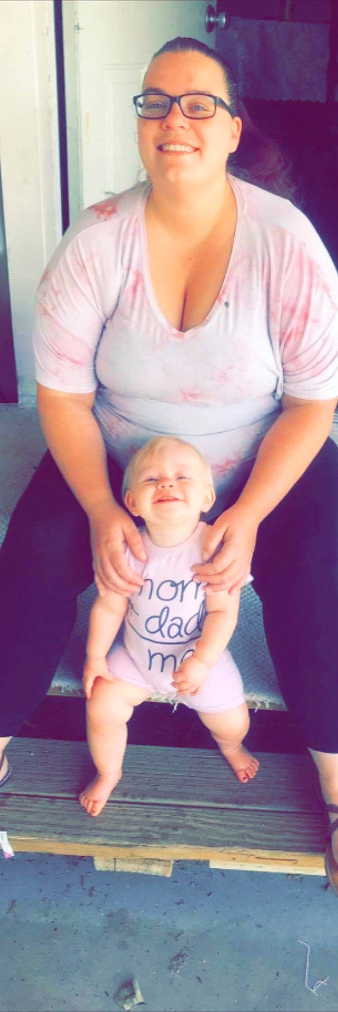 Adora is registered to the contest to win money with this photo: arm, baby, baby_toddler_clothing, cheek, eye, finger, gesture, hairstyle, hand, happy, joint, joy, leg, muscle, person, pink, shoulder, skin, sleeve, standing