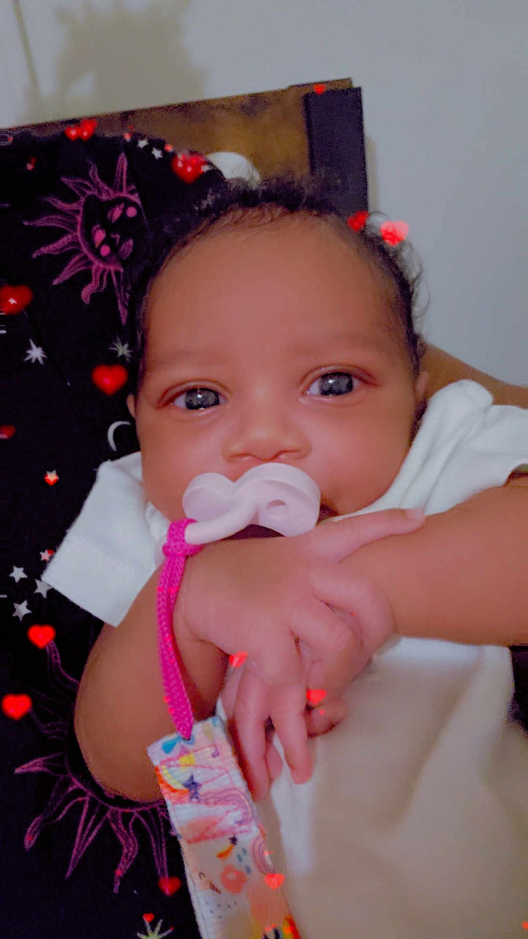 Tamiracle joined the competition — help win amazing prizes! baby, pacifier, hand, infant, cute, closeup, face, child, skin, expression, adorable, person, newborn, sleepwear, comfort, love, heart, background, soft, indoors