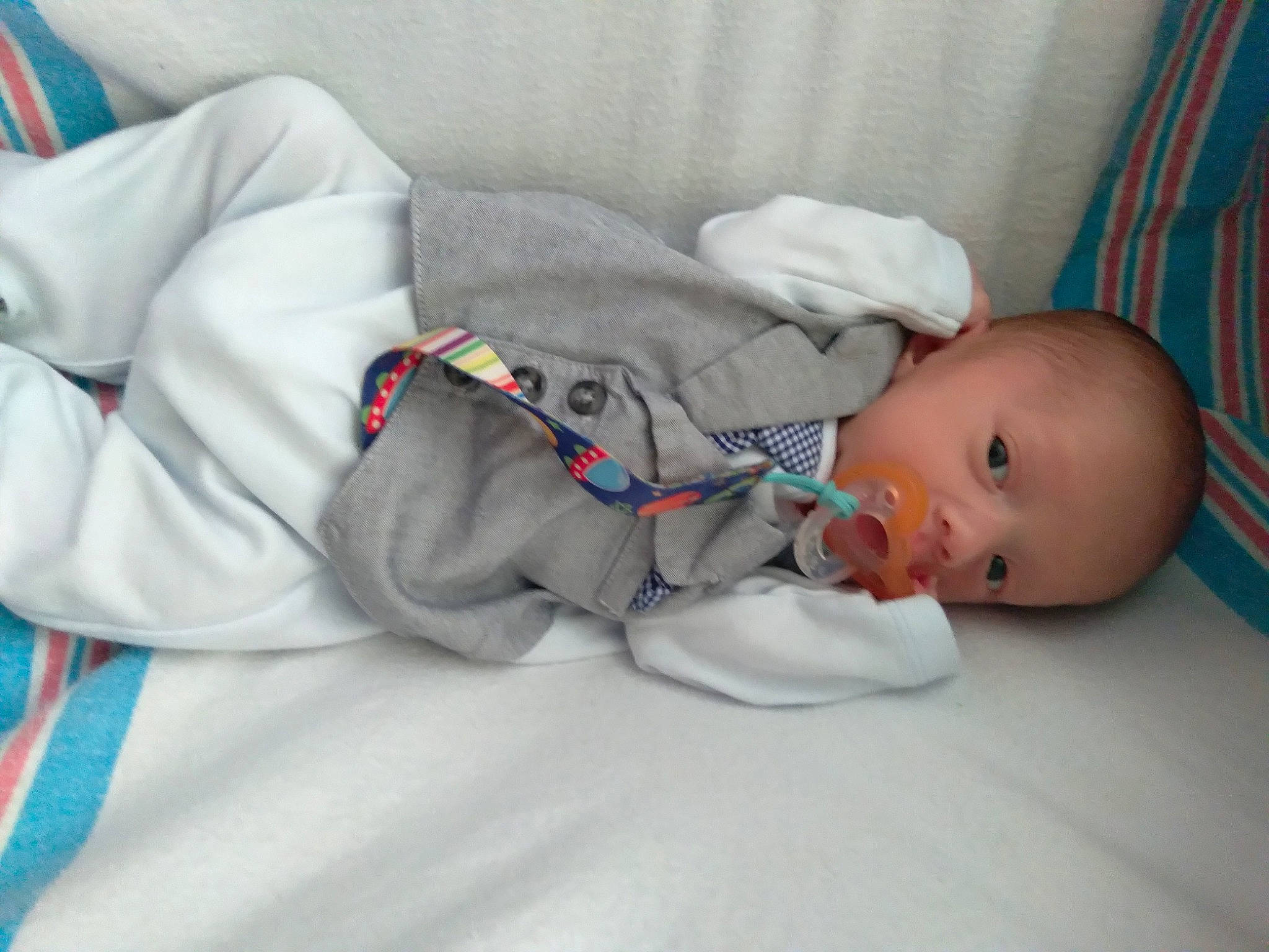 Bruce is registered to the contest to win money with this photo: baby, baby_products, baby_sleeping, baby_toddler_clothing, bedding, bedtime, child, comfort, electric_blue, flooring, linens, nap, person, room, sitting, sleep, sleeve, toddler