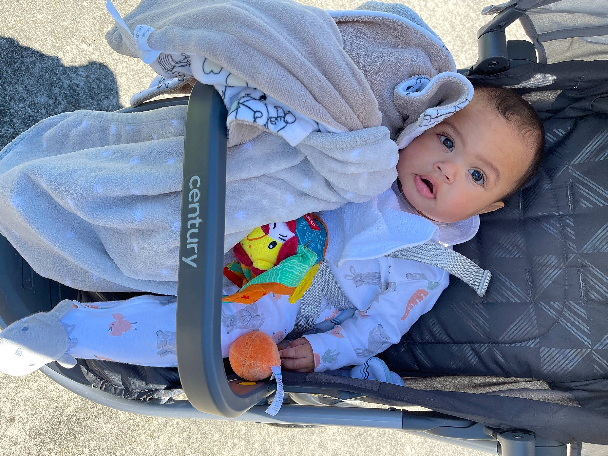 Kyson joined the competition — help win amazing prizes! baby, baby_carriage, baby_products, baby_toddler_clothing, child, comfort, electric_blue, fashion_accessory, lap, pattern, person, sitting, sleeve, toddler