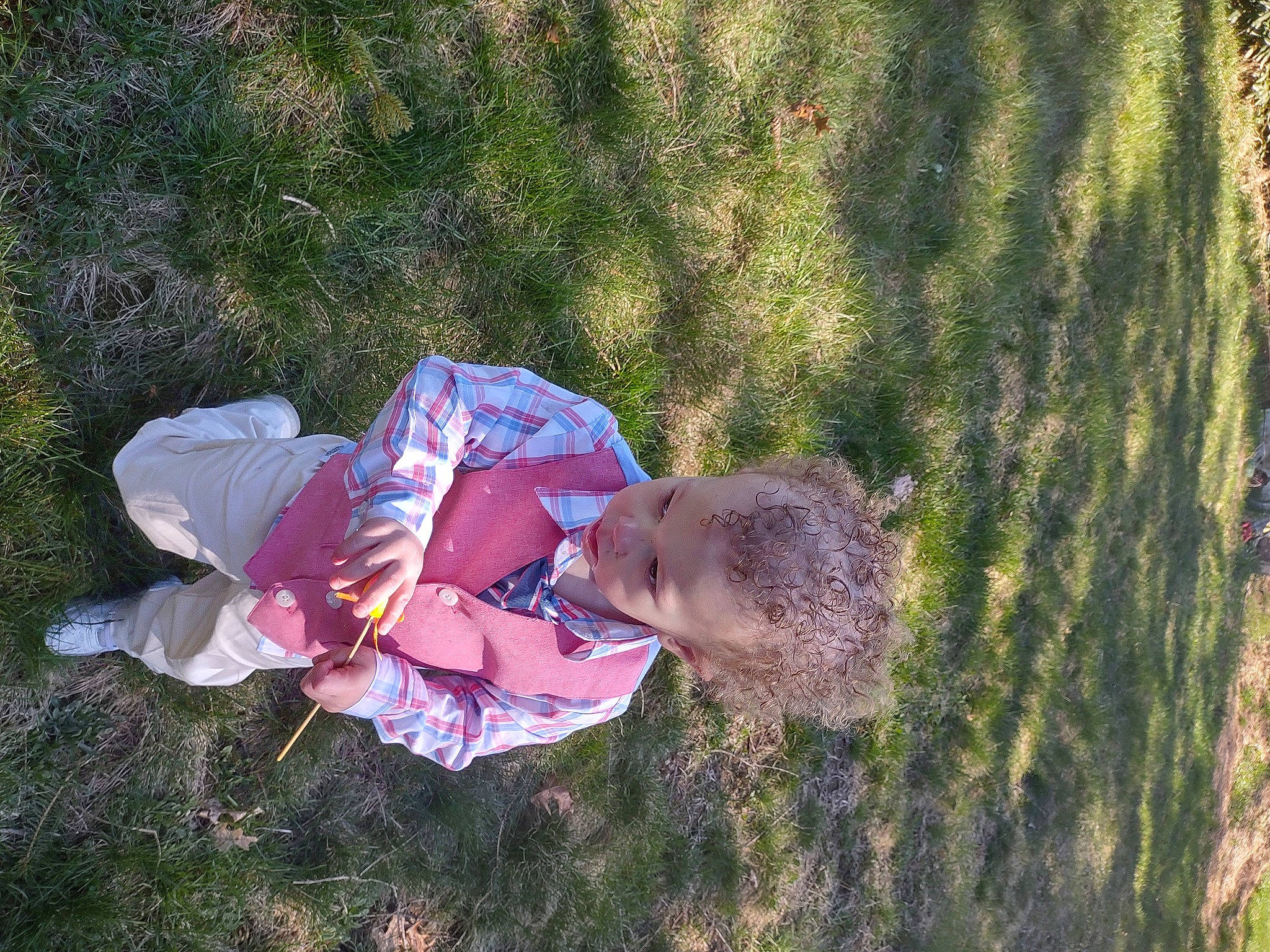 Ryder is registered to the contest to win money with this photo: child, fun, grass, grass_family, grassland, hat, landscape, leisure, people_in_nature, person, plant, recreation, soil, toddler, tree