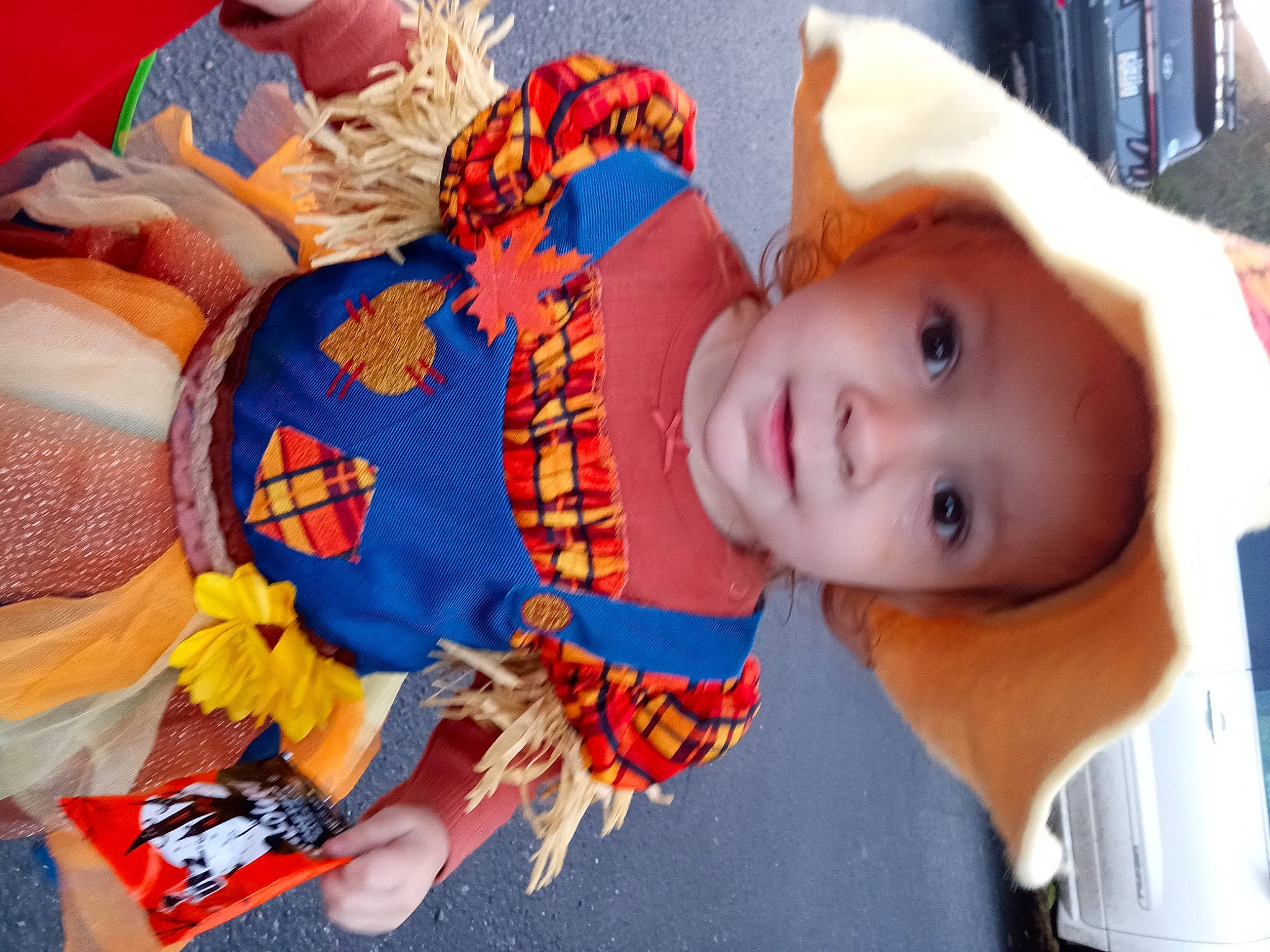 Jocelyn is registered to the contest to win money with this photo: baby, baby_products, baby_toddler_clothing, cheek, child, comfort, craft, fun, hat, headwear, iris, mouth, orange, pattern, person, room, shelf, skin, stuffed_toy, toddler