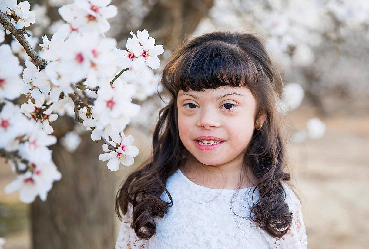 Ashley joined the competition — help win amazing prizes! branch, dress, eye, face, facial_expression, flash_photography, flower, hair, hairstyle, happy, joy, lip, nature, people_in_nature, person, petal, plant, skin, smile, textile
