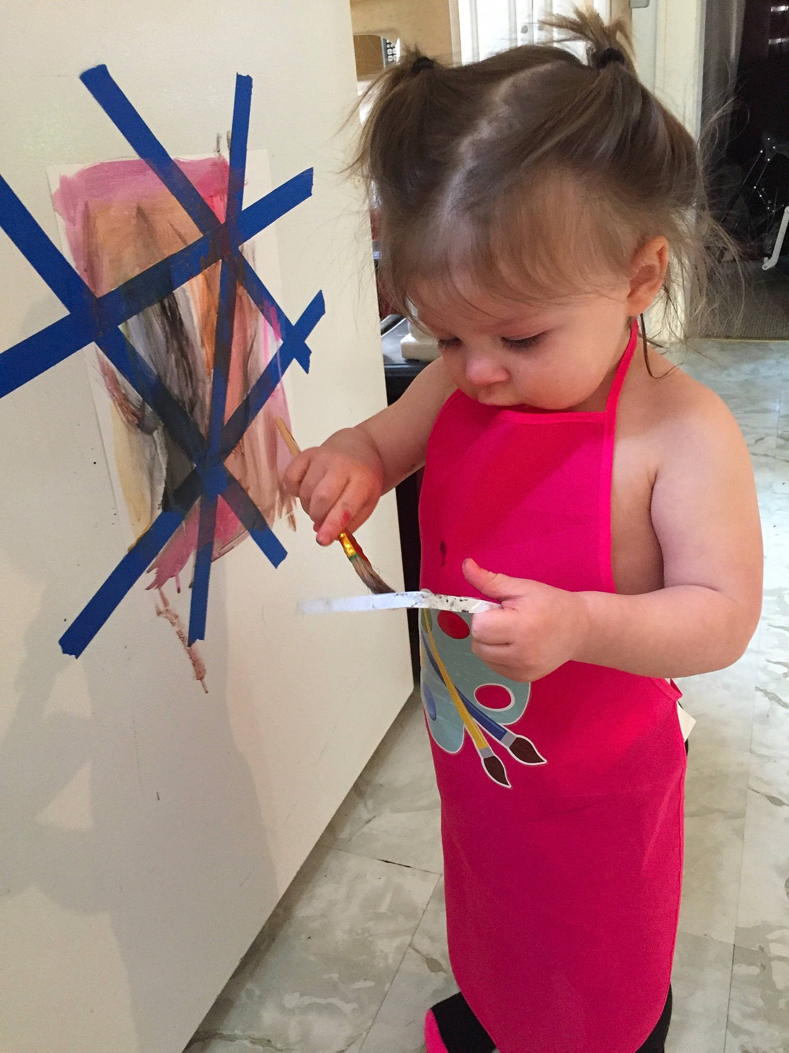 Alaina is registered to the contest to win money with this photo: arm, art, auto_part, automotive_wheel_system, child, design, drawing, hand, joint, paper, pattern, person, pink, play, shoulder, toddler, visual_arts, wheel