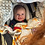 Alexander is registered to the contest to win money with this photo: baby, infant, smiling, car_seat, blanket, plush_blanket, head_support, eyes, face, shopping_cart, seatbelt, clothing, cozy, portrait, parent_hair, smartphone, warning_label, indoor, happy, newborn