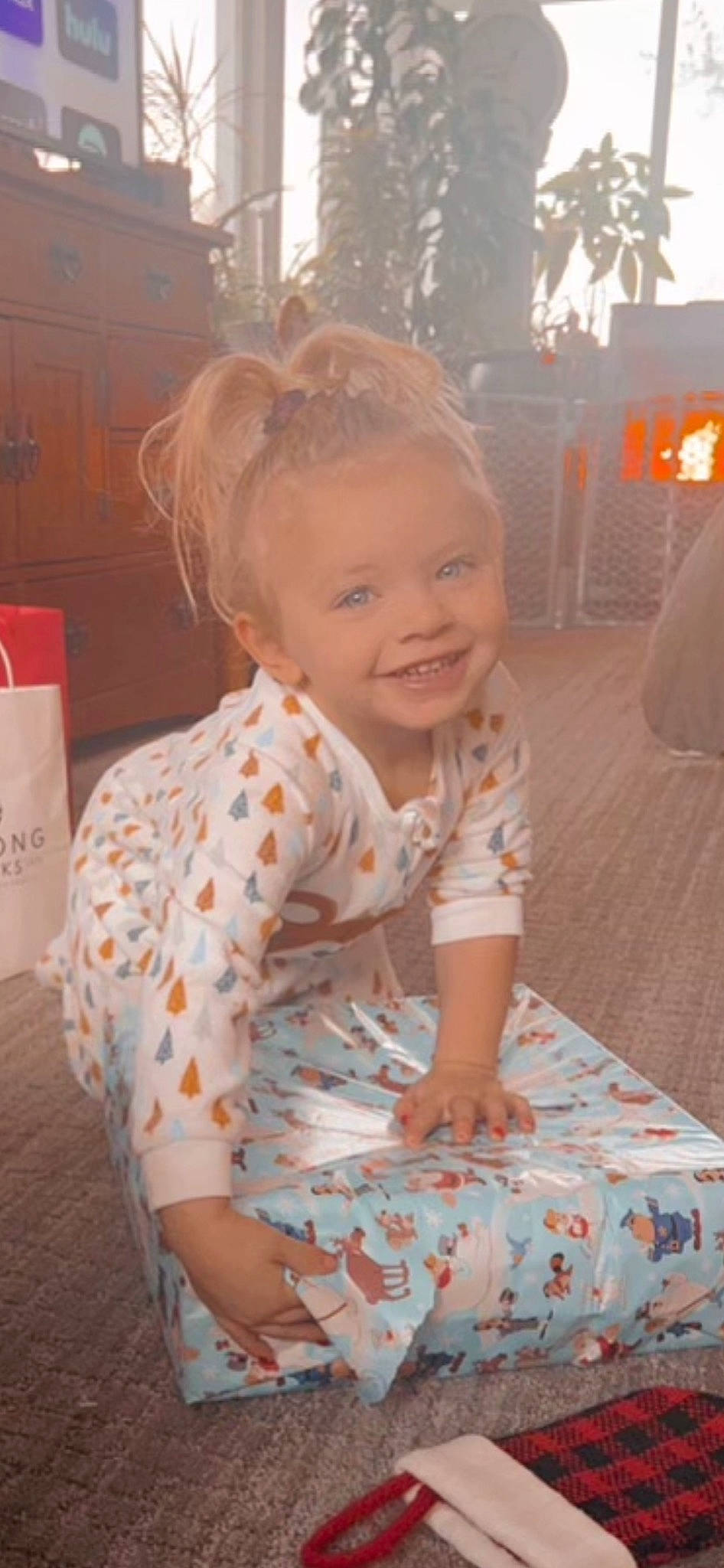 Karsyn joined the competition — help win amazing prizes! baby, baby_toddler_clothing, child, dress, event, flooring, fun, hairstyle, happy, head, joy, linens, pattern, person, pink, sitting, skin, sleeve, smile, standing