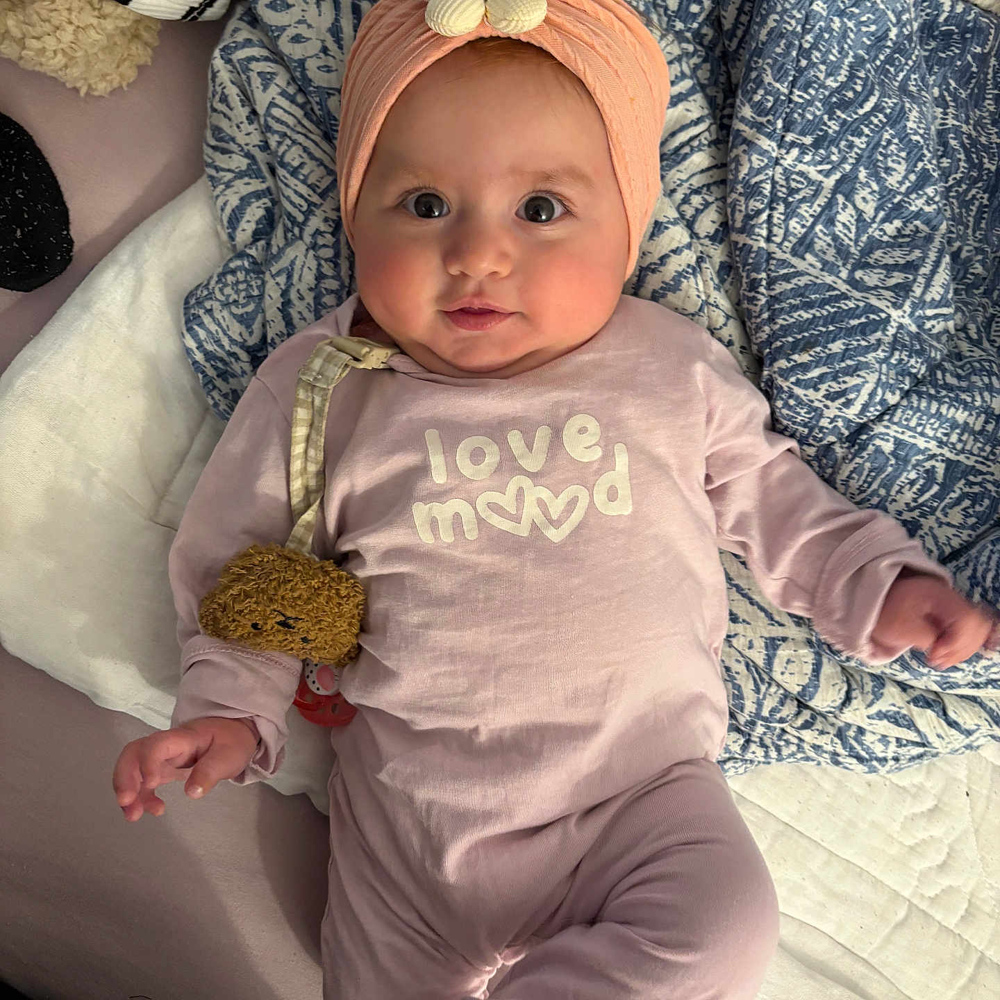 Zerrin participe au concours pour gagner de l'argent avec cette photo : baby, bed, blanket, child, cozy, cushion, cute, face, feet, flower, hands, headband, indoors, infant, pink_outfit, portrait, smiling, soft_lighting, teddy_bear, toy