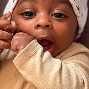 Royal joined the competition — help win amazing prizes! animal_print, baby, beige_clothing, child, close_up, cozy, cute, expression, face, hand, hat, headwear, infant, open_mouth, portrait, skin, soft_texture, warm_lighting, wide_eyes, young_child