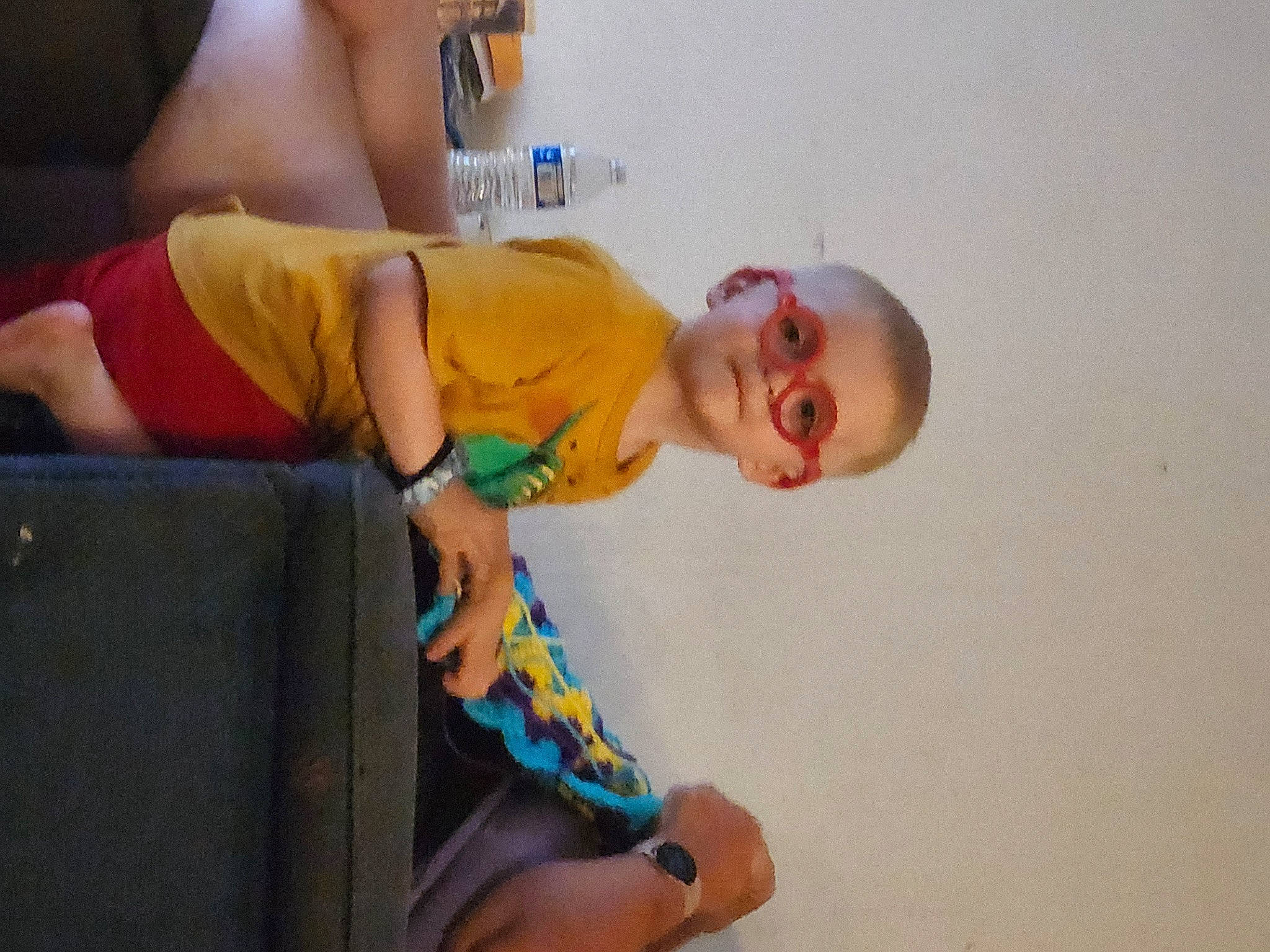 Colt is registered to the contest to win money with this photo: abdomen, baby, chest, child, elbow, event, finger, fun, happy, human_leg, joint, knee, leisure, muscle, person, shorts, smile, thigh, toddler, trunk