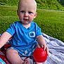 baby, child, blue_shirt, shorts, red_ball, blanket, outdoor, grass, greenery, sitting, cute, playful, infant, person, head, face, foot, hand, summer, nature