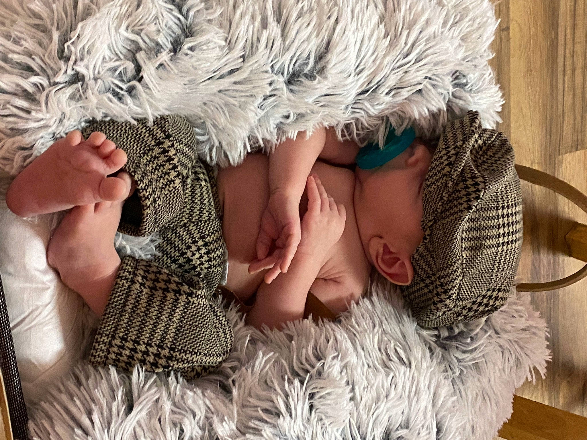 Cody Jr joined the competition — help win amazing prizes! baby, baby_toddler_clothing, cap, comfort, dress, finger, flooring, foot, grass, happy, hat, human_body, leg, linens, pattern, person, textile, toddler, wood, wool