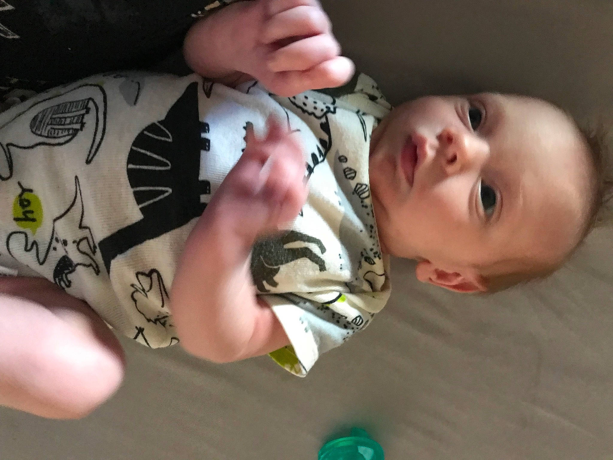 Cody Jr is registered to the contest to win money with this photo: baby, baby_toddler_clothing, cheek, child, elbow, eye, eyelash, finger, gesture, hand, happy, mouth, neck, nose, pattern, person, skin, sleeve, thumb, toddler