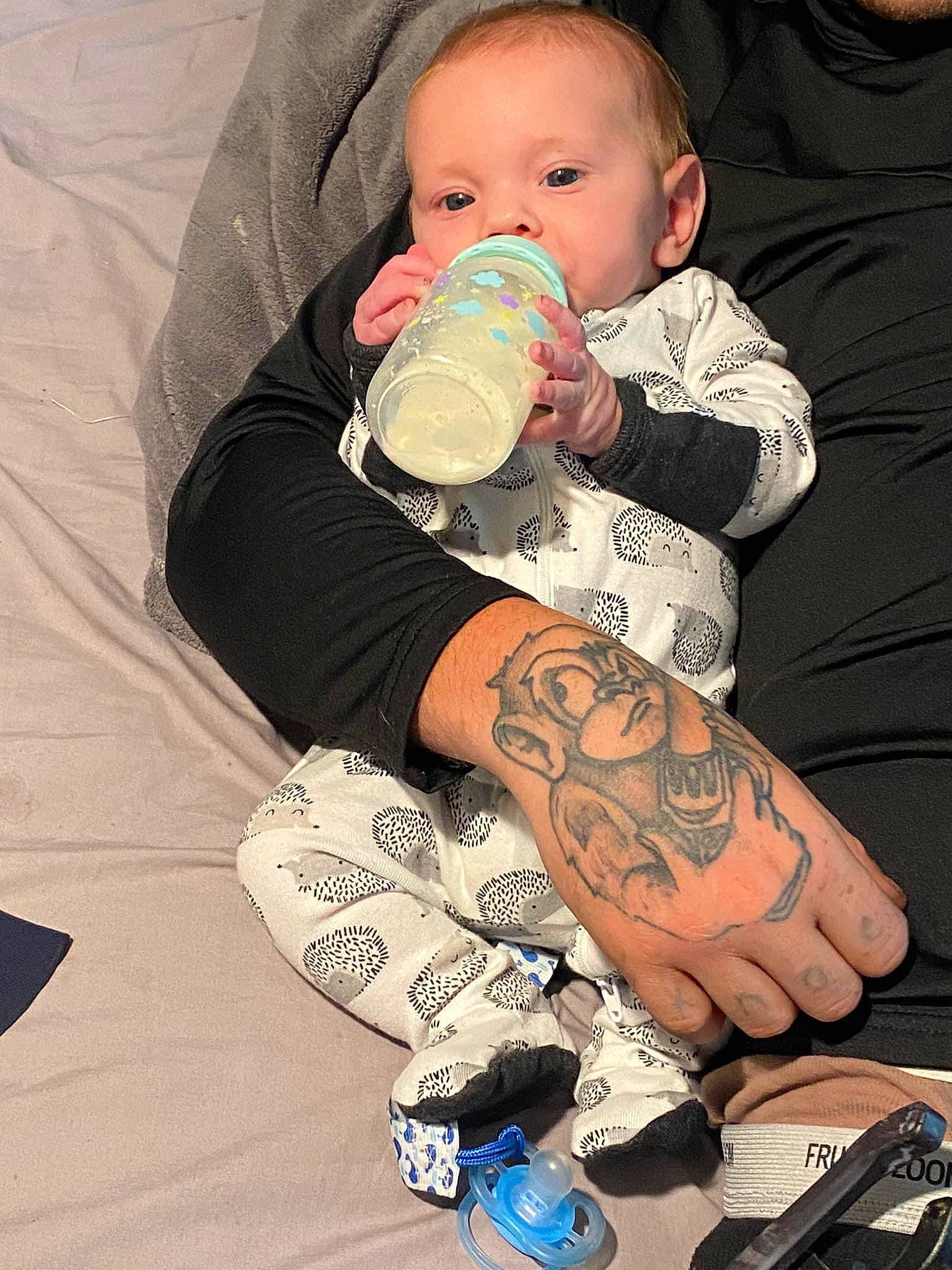 Cody Jr joined the competition — help win amazing prizes! arm, baby, baby_bottle, baby_toddler_clothing, bottle, comfort, cool, drinkware, elbow, finger, hand, human_body, human_leg, joint, knee, leg, person, sleeve, temporary_tattoo, thigh