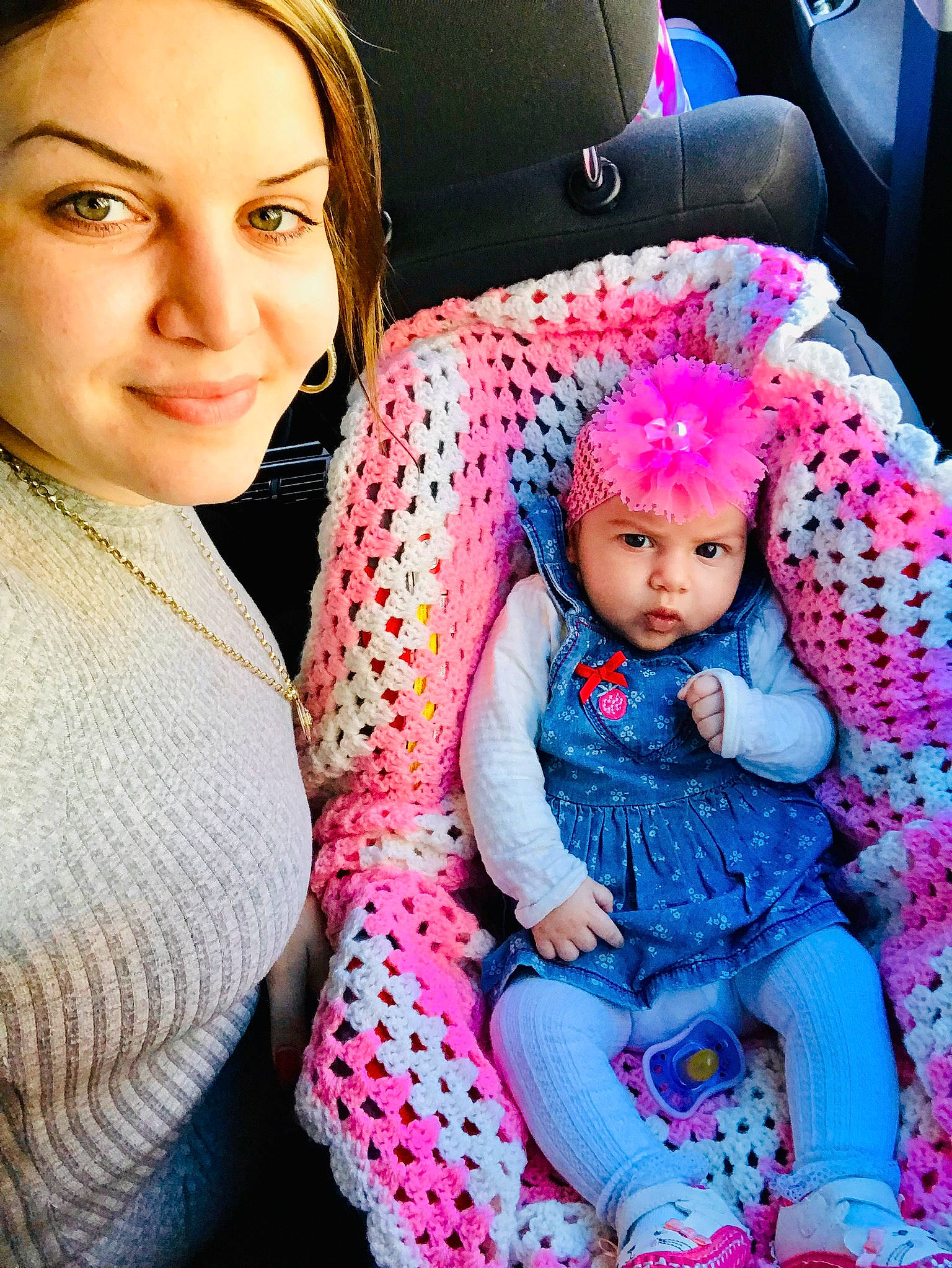 Romeisa joined the competition — help win amazing prizes! baby, car_seat, child, crochet, face, head, headgear, headwear, joy, knitting, outerwear, people, person, pink, sitting, skin, toddler