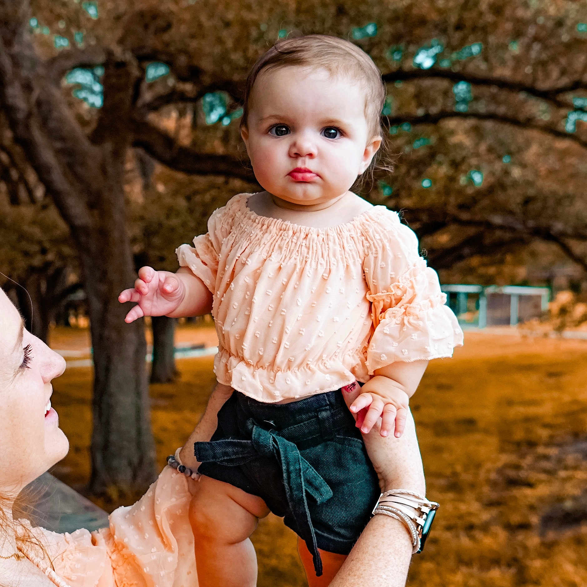 Harper joined the competition — help win amazing prizes! baby, blonde, blouse, bodypart, clothing, dress, face, finger, grass, hand, head, jeans, pants, people, person, photography, plant, portrait, shorts, tree