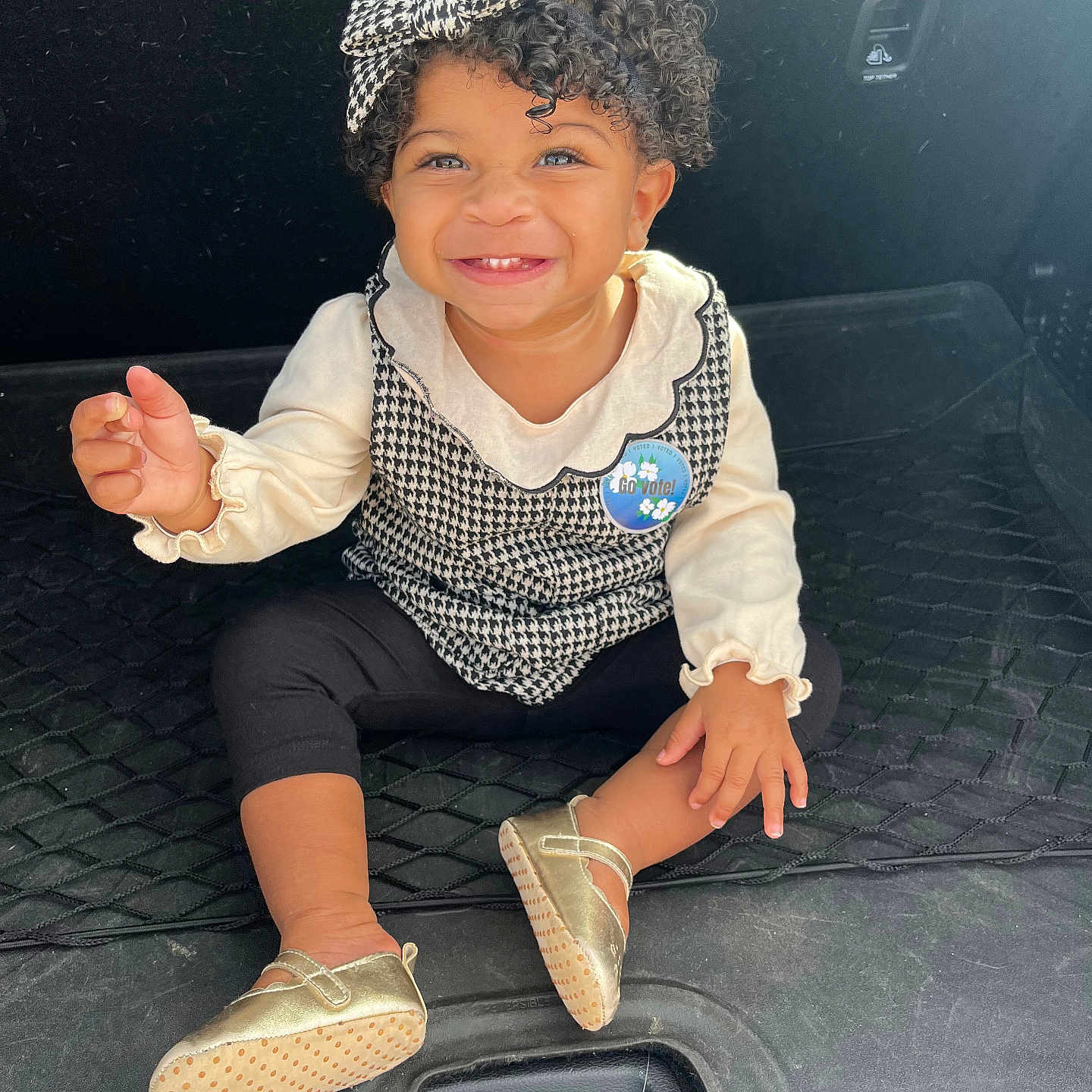 Berlin is registered to the contest to win money with this photo: bodypart, child, clothing, face, female, finger, footwear, girl, hand, happy, head, pants, person, photography, portrait, shoe, sitting, sleeve, smile, sneaker