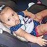 baby, infant, child, car_seat, portrait, sitting, lying_down, wide_eyes, facial_expression, bow, hair_bow, polka_dots, dress, red_shoes, shoes, pink, vehicle_interior, car, indoors, close_up