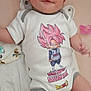 baby, infant, onesie, cartoon_character, dragon_ball, pink_hair, lying_down, blanket, pacifier, cute, smile, child, soft_toys, clothing, indoor, person, portrait, baby_girl, baby_boy, happy