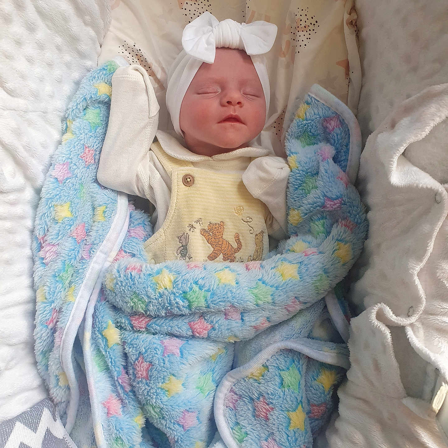 Rainy-Storm joined the competition — help win amazing prizes! baby, blanket, bow, child, clothing, cute, face, headband, infant, lying_down, pattern, peaceful, portrait, sleeping, soft, star_pattern, toddler, white, yellow, young