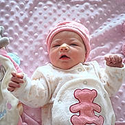 Adriana a rejoint le concours — aidez-le/la à gagner de superbes lots ! adorable, baby, cat_toy, child, cozy, crocheted_bunny, cute, indoors, infant, lying_down, newborn, pink_bear_design, pink_blanket, pink_hat, plush_toy, rattle, sleepy, soft_toys, textured_blanket, white_outfit
