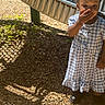 Janiyla joined the competition — help win amazing prizes! blue, checkered, child, dress, face, footwear, grass, hand, happy, nature, outdoor, person, playground, shadow, slide, summer, sunlight, toddler, white, woodchips