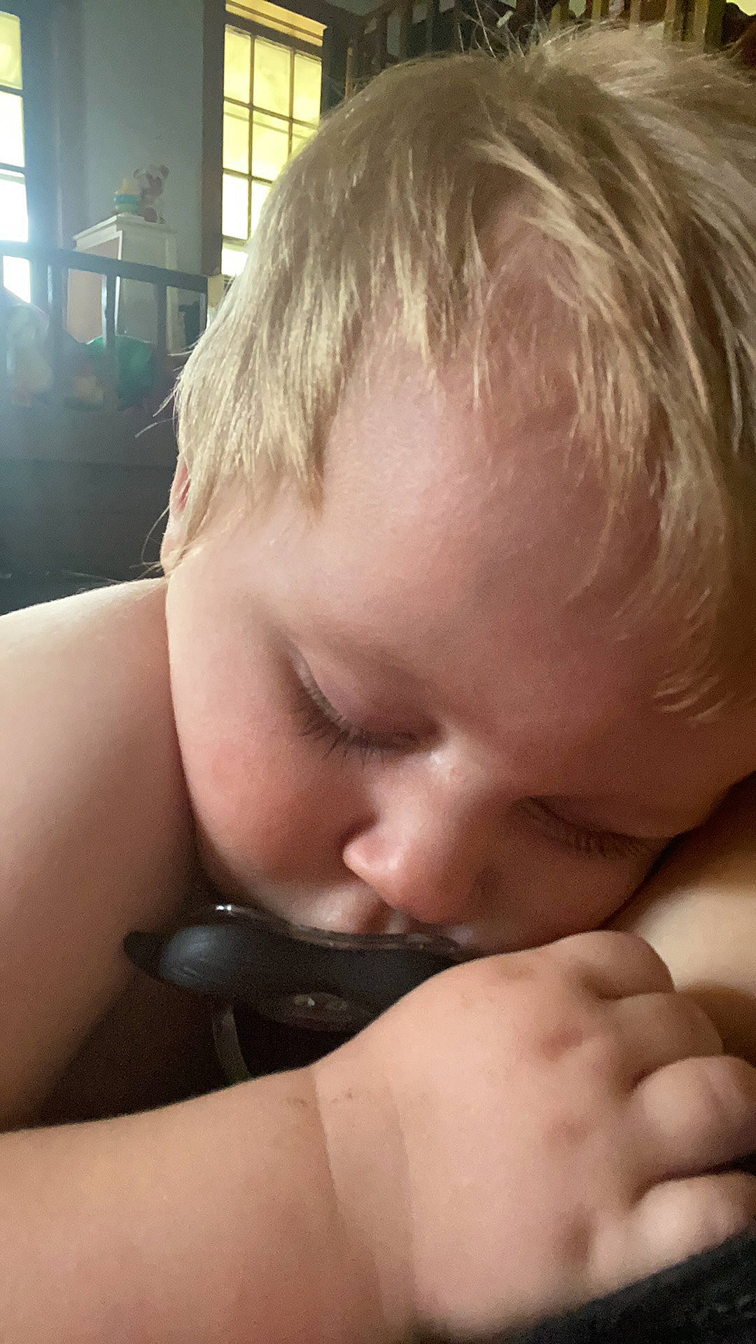 Bently is registered to the contest to win money with this photo: baby, blond, cheek, child, close_up, face, finger, gesture, hand, mouth, nose, person, skin, toddler