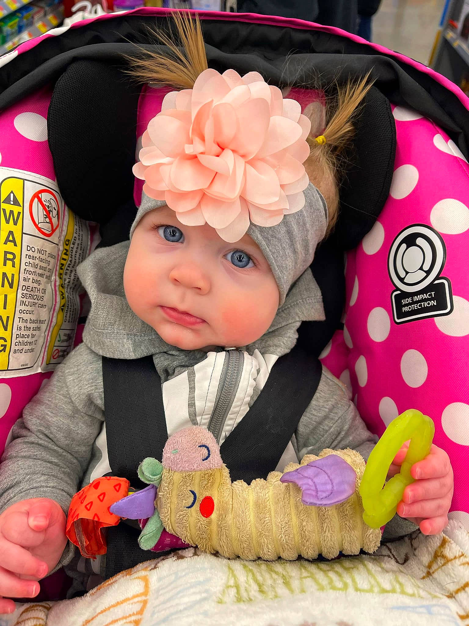 Annabella joined the competition — help win amazing prizes! baby, baby_carriage, baby_products, baby_toddler_clothing, cap, car_seat, cheek, child, chin, comfort, fashion_accessory, flower, head, headgear, headwear, knit_cap, person, pink, skin, sun_hat