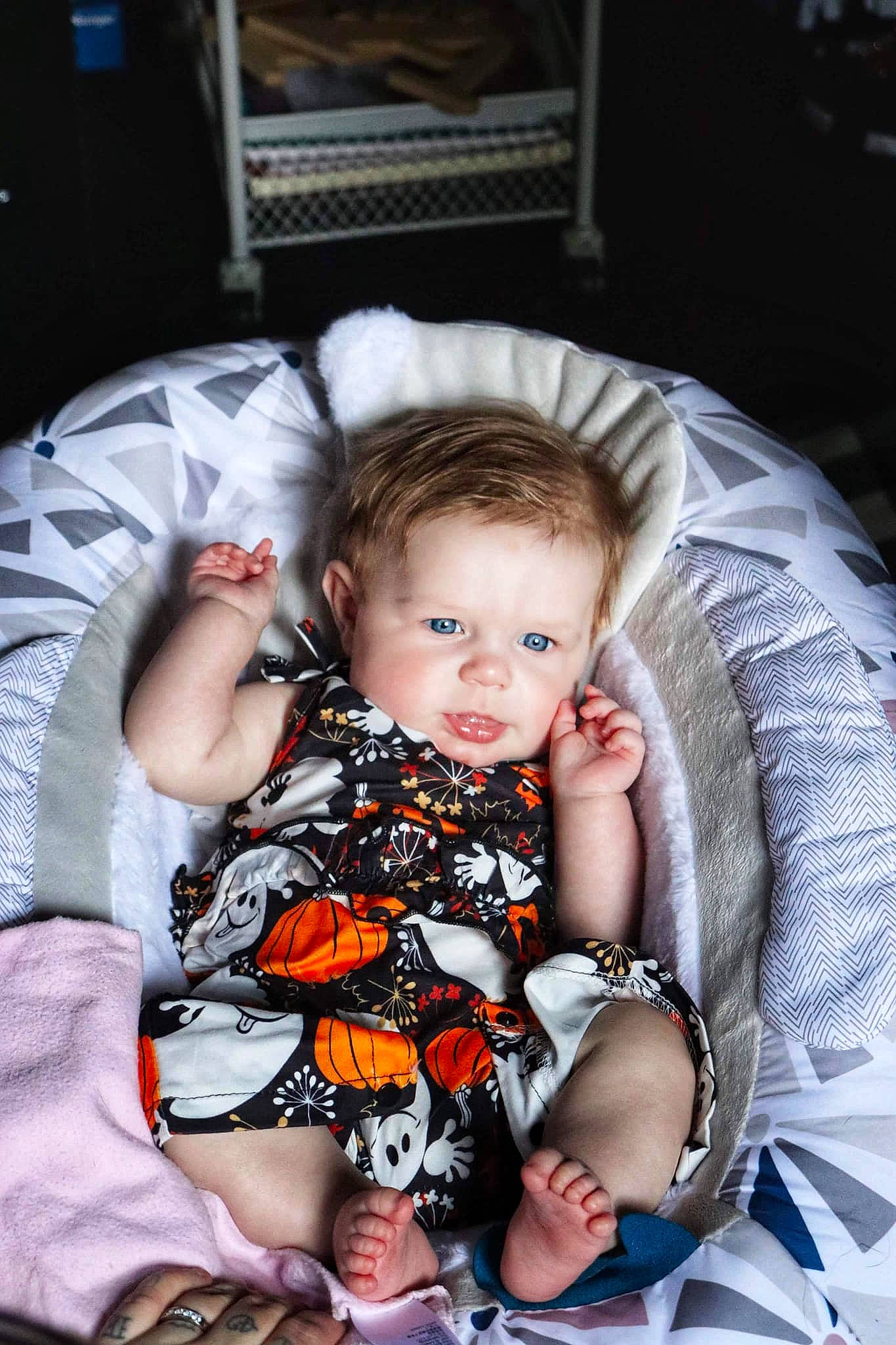 Annabella is registered to the contest to win money with this photo: baby, baby_toddler_clothing, child, comfort, couch, dress, event, facial_expression, finger, flash_photography, fun, hairstyle, happy, lap, linens, pattern, person, sitting, skin, smile