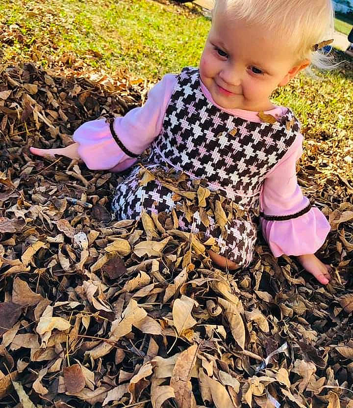 Eloise is registered to the contest to win money with this photo: adaptation, autumn, baby, child, grass, joy, leaf, person, plant, play, smile, toddler