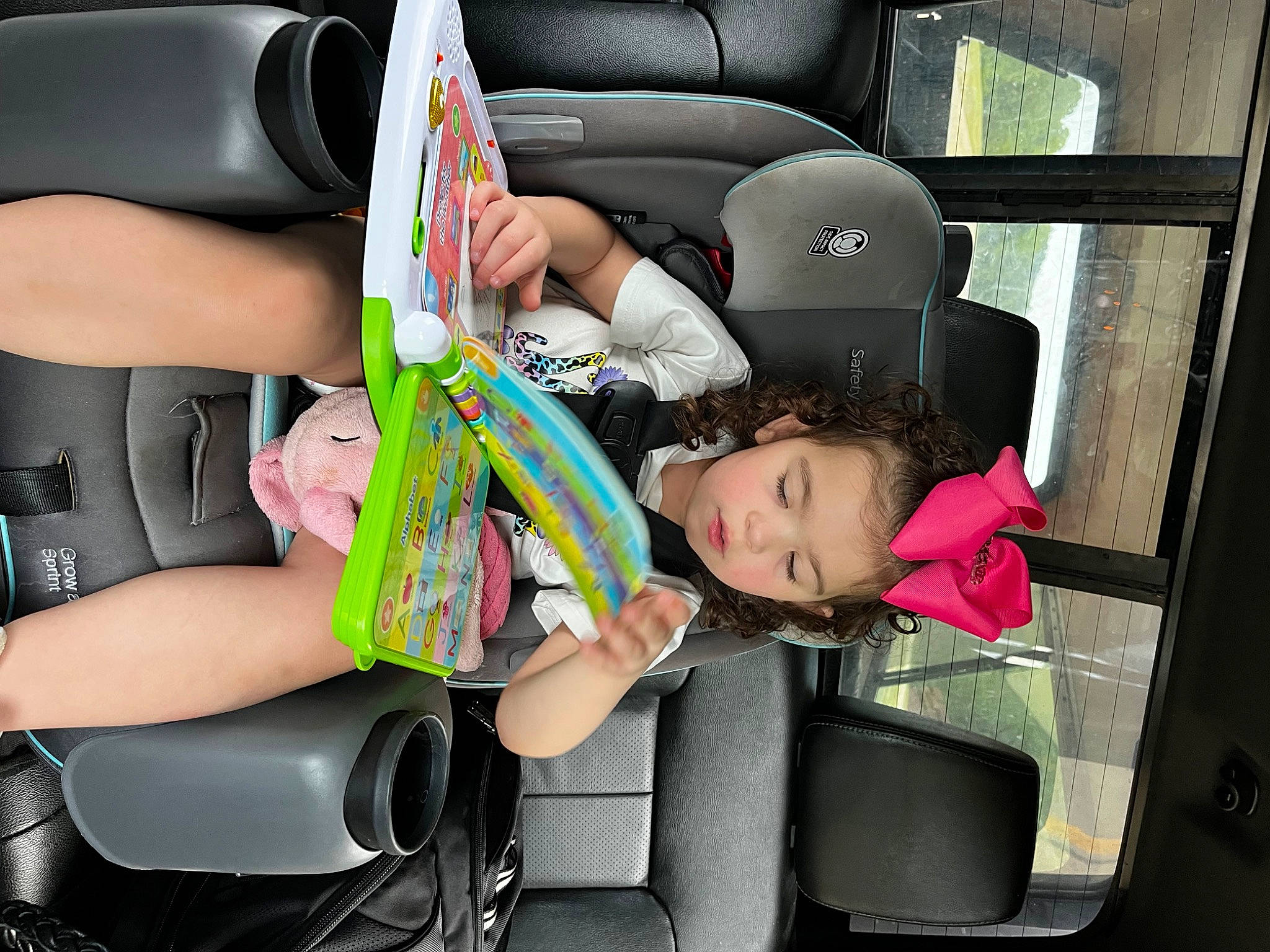 Makenzie is registered to the contest to win money with this photo: auto_part, automotive_design, automotive_exterior, baby_carriage, car_seat, car_seat_cover, child, comfort, family_car, fun, head_restraint, leisure, mode_of_transport, motor_vehicle, passenger, person, seat_belt, thigh, toddler, vehicle